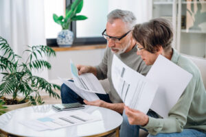 Couple looking at electricity bills.